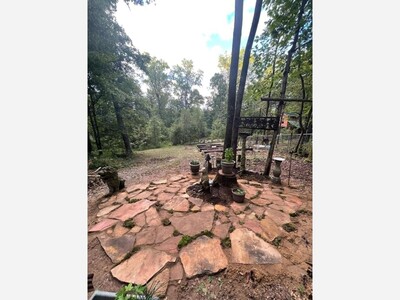 REAL ESTATE: 9.38 acres in Macon-Bibb/Jones Co. with barn, year round creek, well, and more